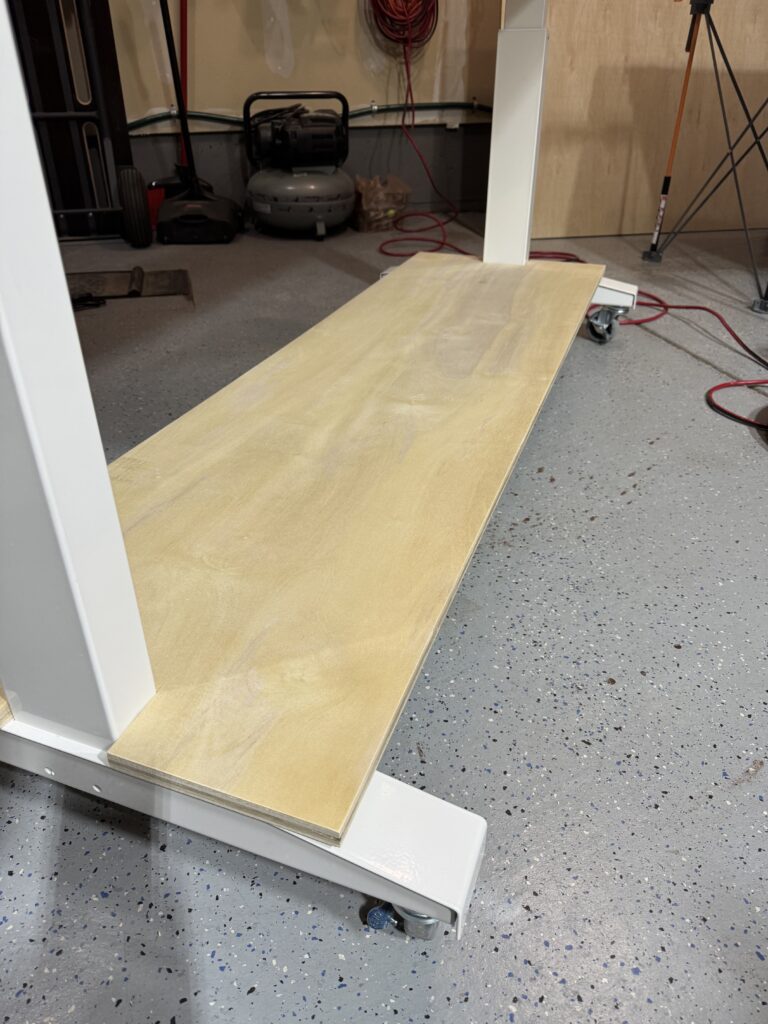 The bottom of the cabinet in the Husky adjustable-height table.