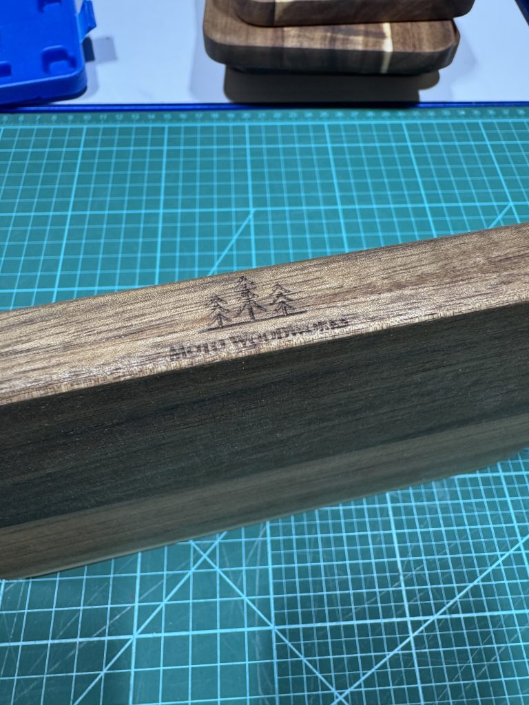 I put my logo on the edge of these charcuterie boards.