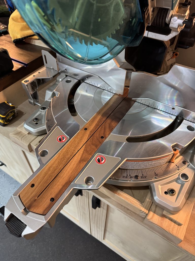 Miter saw throat plate from the right