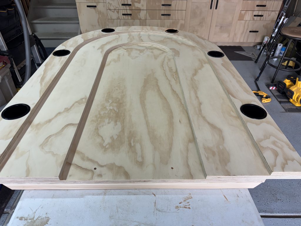 Custom poker table with cupholders.